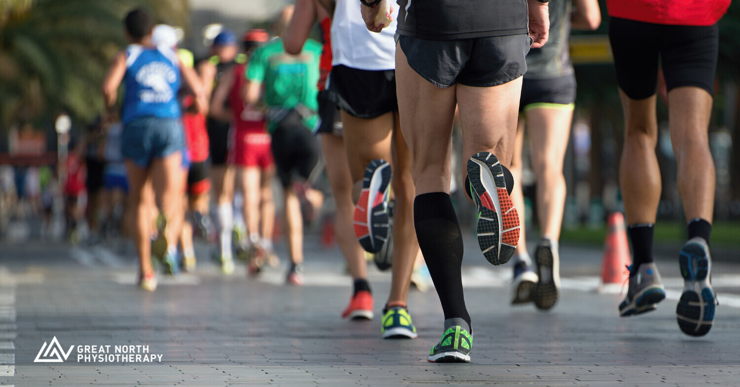 Group of runners training outdoors, representing running injuries and foot numbness treated at Great North Physiotherapy in Niagara